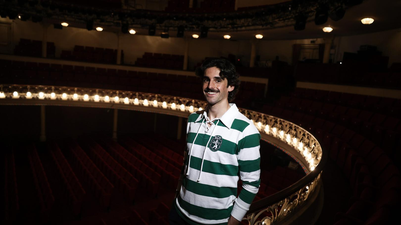 Francisco Trincao stands in a Sporting shirt at a Lisbon theatre