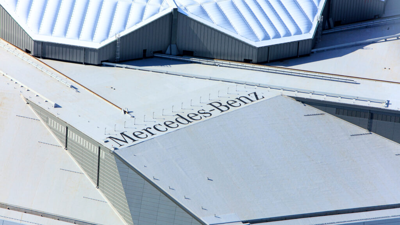 Close view of Mercedes-Benz lettering painted across the Atlanta stadium roof
