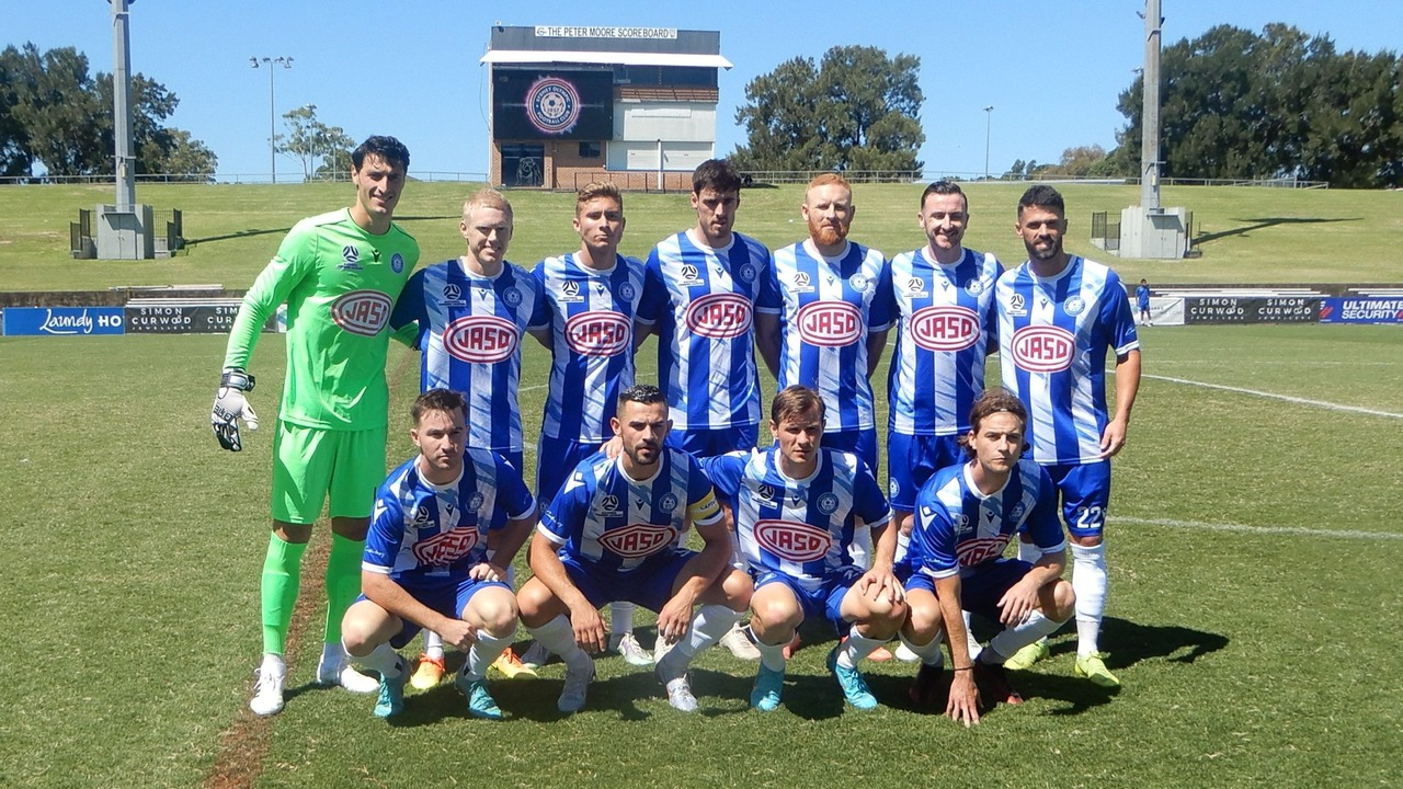 Sydney Olympic players pose for a team photograph