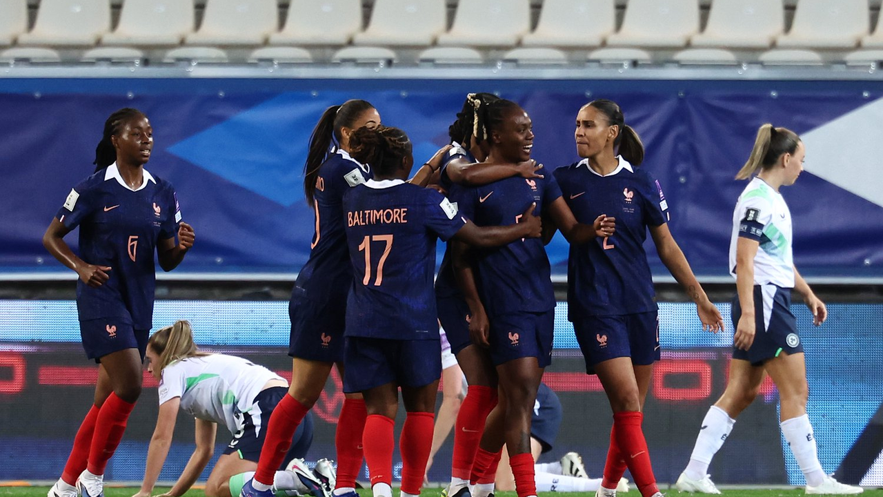 Melvine Malard celebrates with France teammates after scoring against Ireland