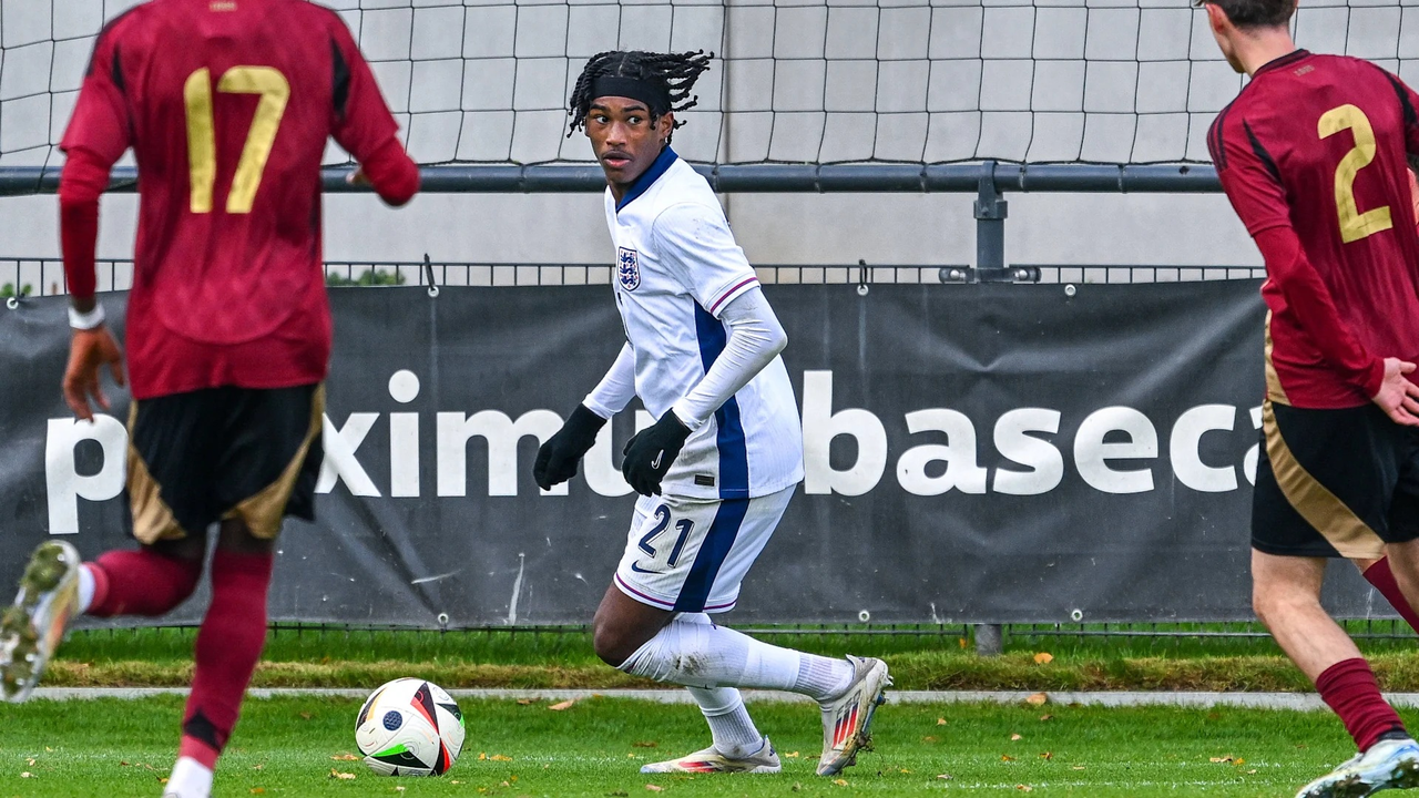 Reigan Heskey carries the ball for England at youth level