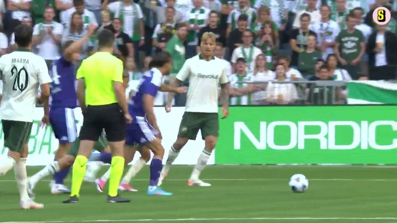 Hammarby and Anderlecht players compete during the match
