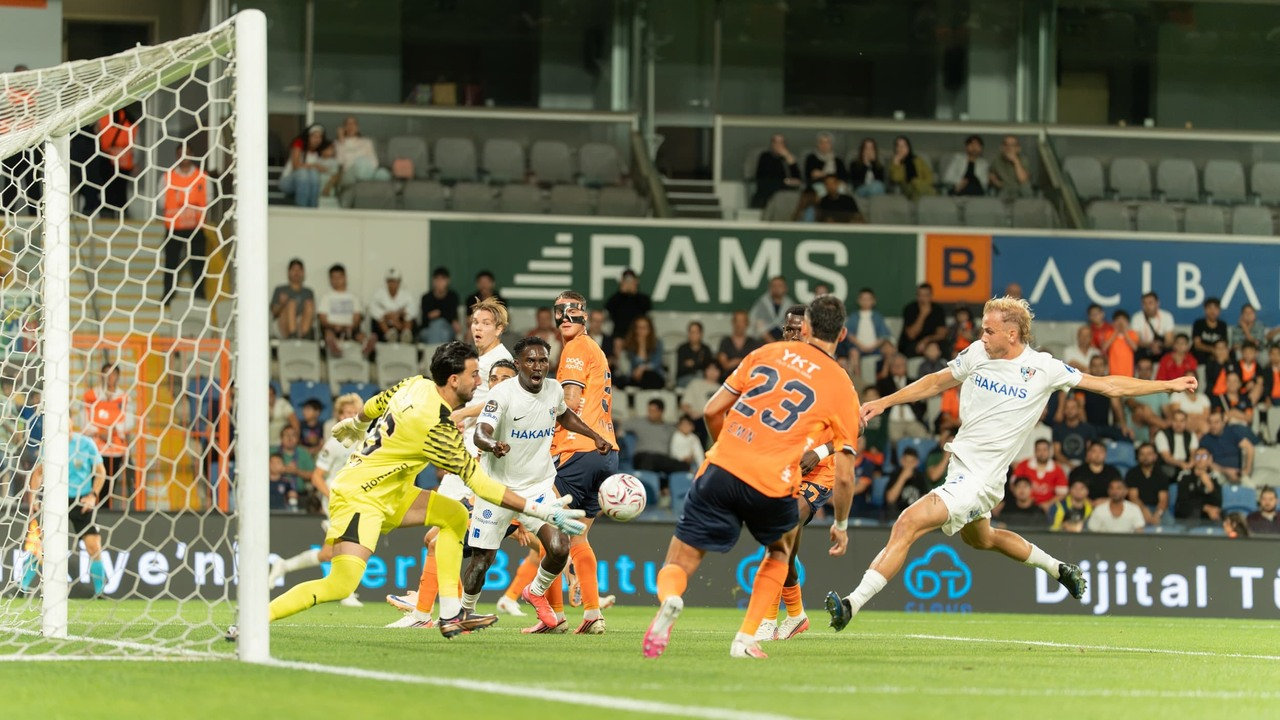 Inter Turku and Basaksehir players contest the ball in the penalty area