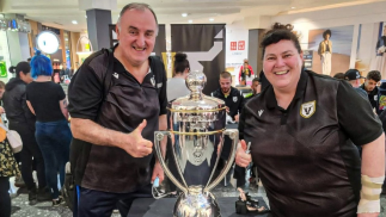 Macarthur Bulls players celebrate with supporters