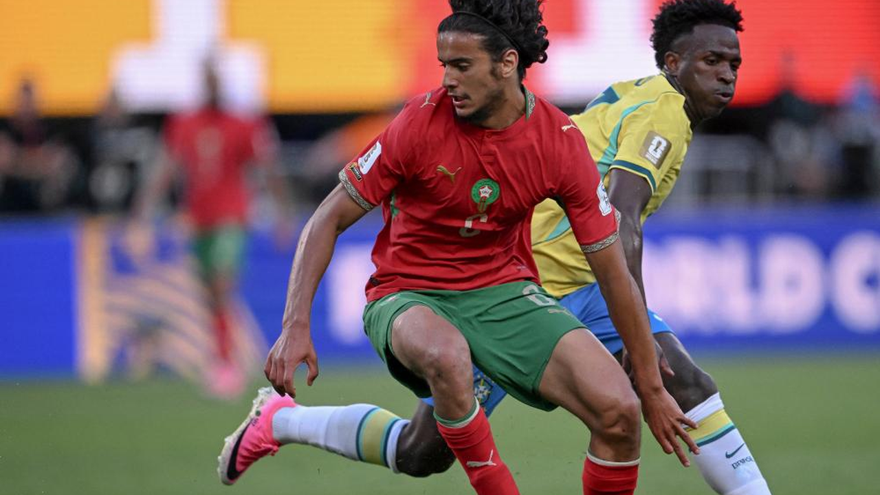 Morocco midfielder Ayyoub Bouaddi carrying the ball under pressure