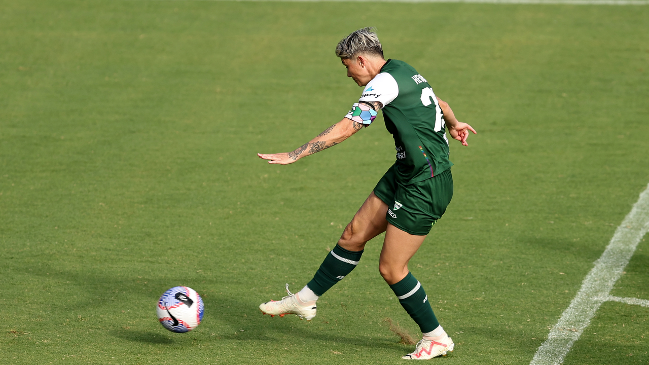 Canberra United captain Michelle Heyman strikes the ball in an A-League Women match