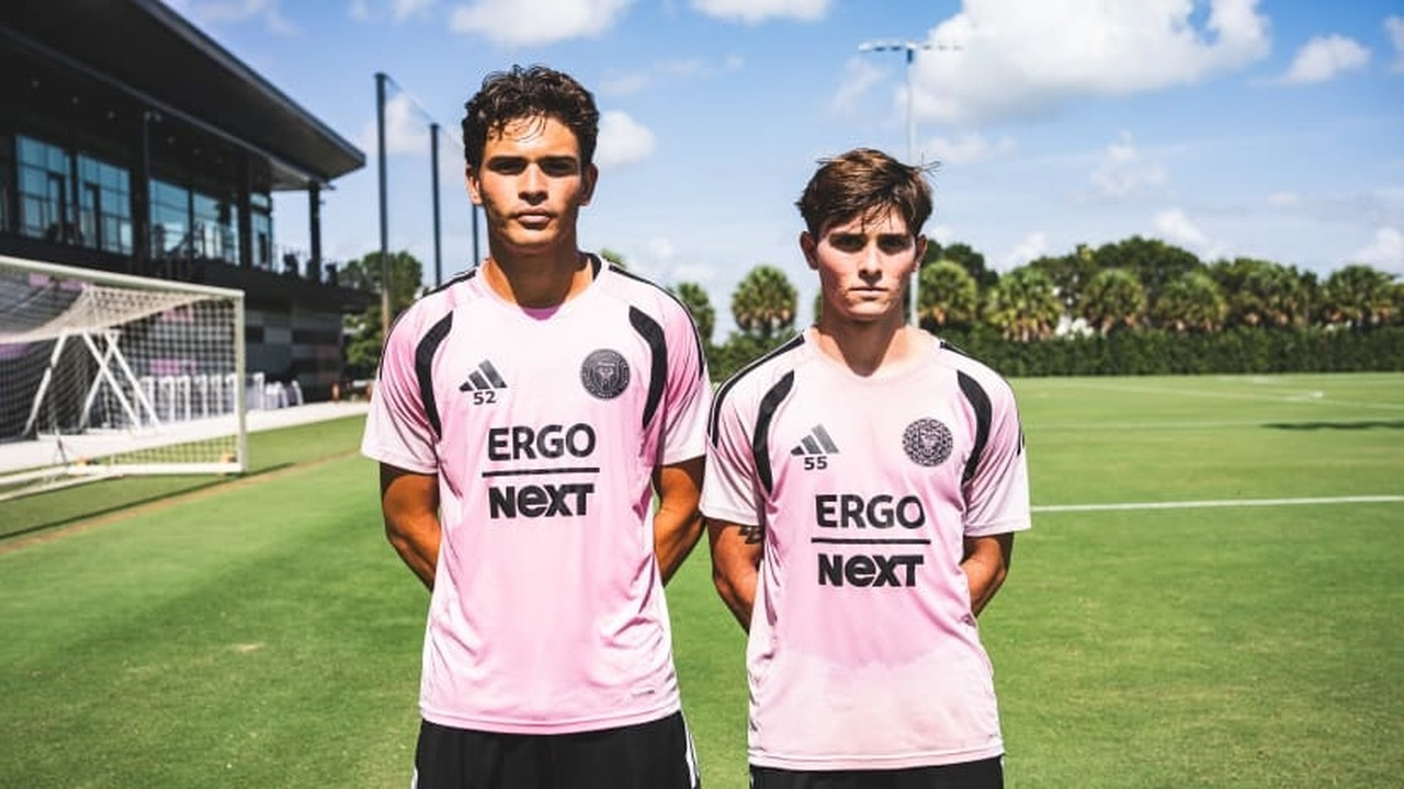 Inter Miami players celebrate together on the pitch