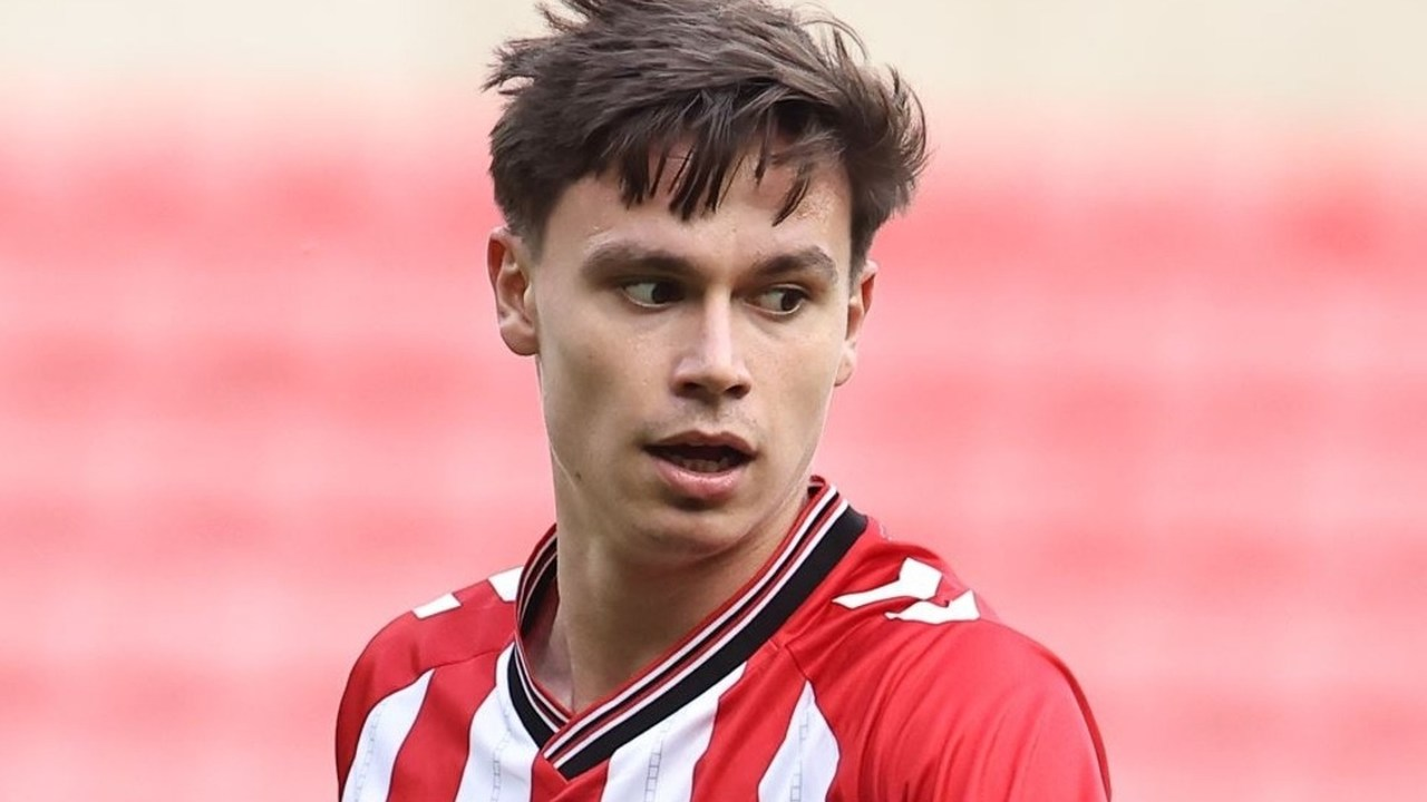 Timur Tutierov in an Exeter City shirt