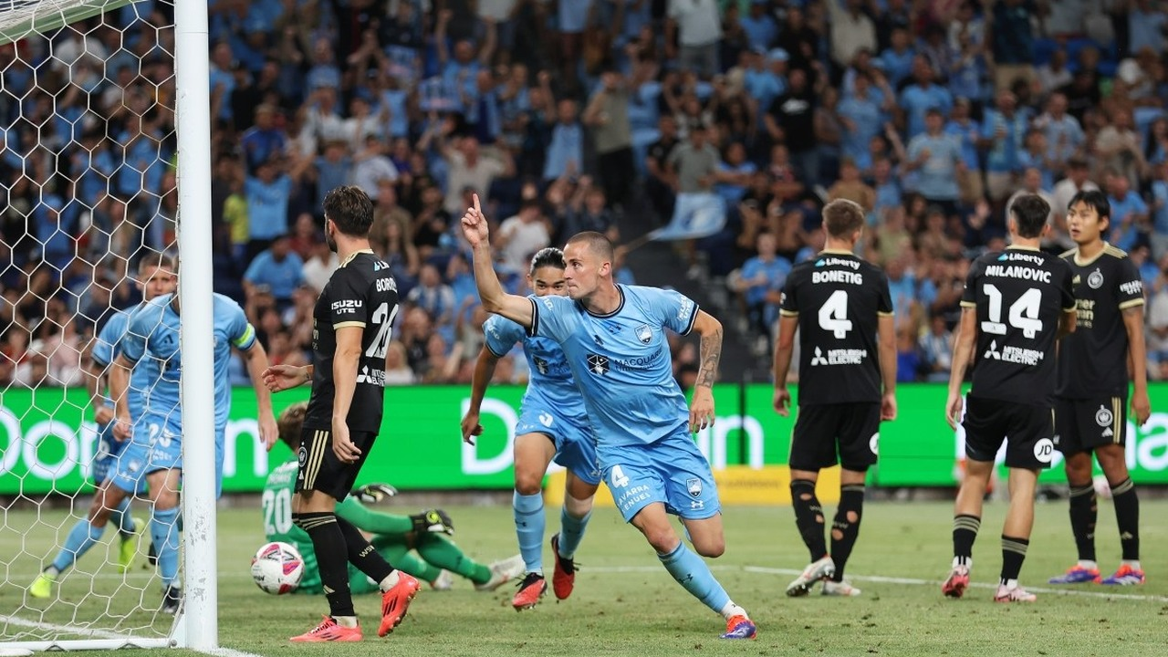 Sydney FC players attack the goal during a match at Allianz Stadium