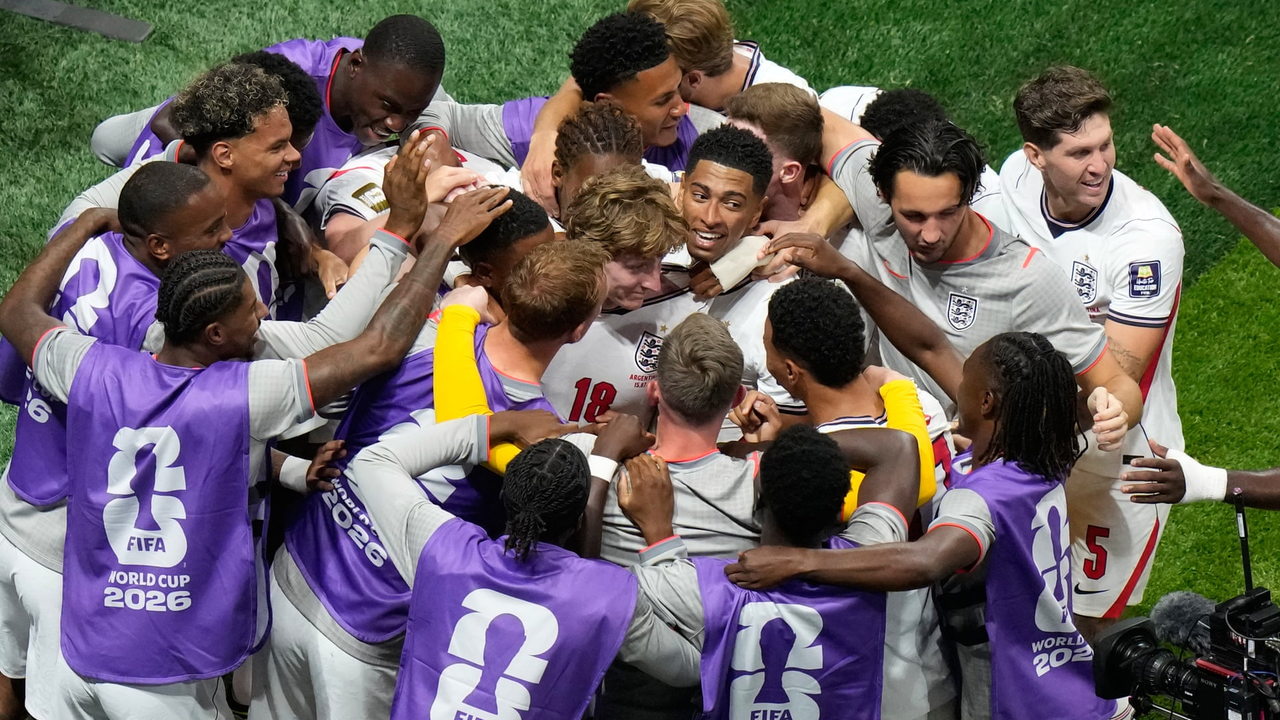 England players celebrate Anthony Gordon's goal against Argentina