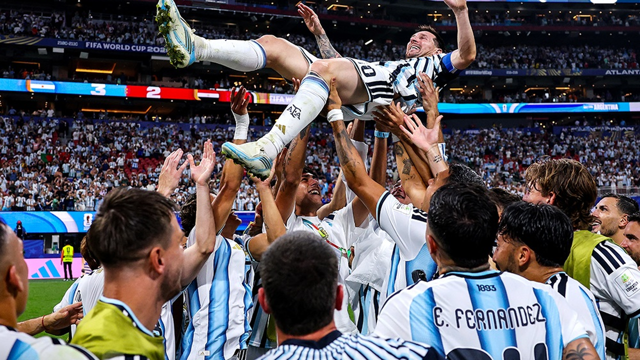 Argentina players celebrate with Lionel Messi during the current tournament