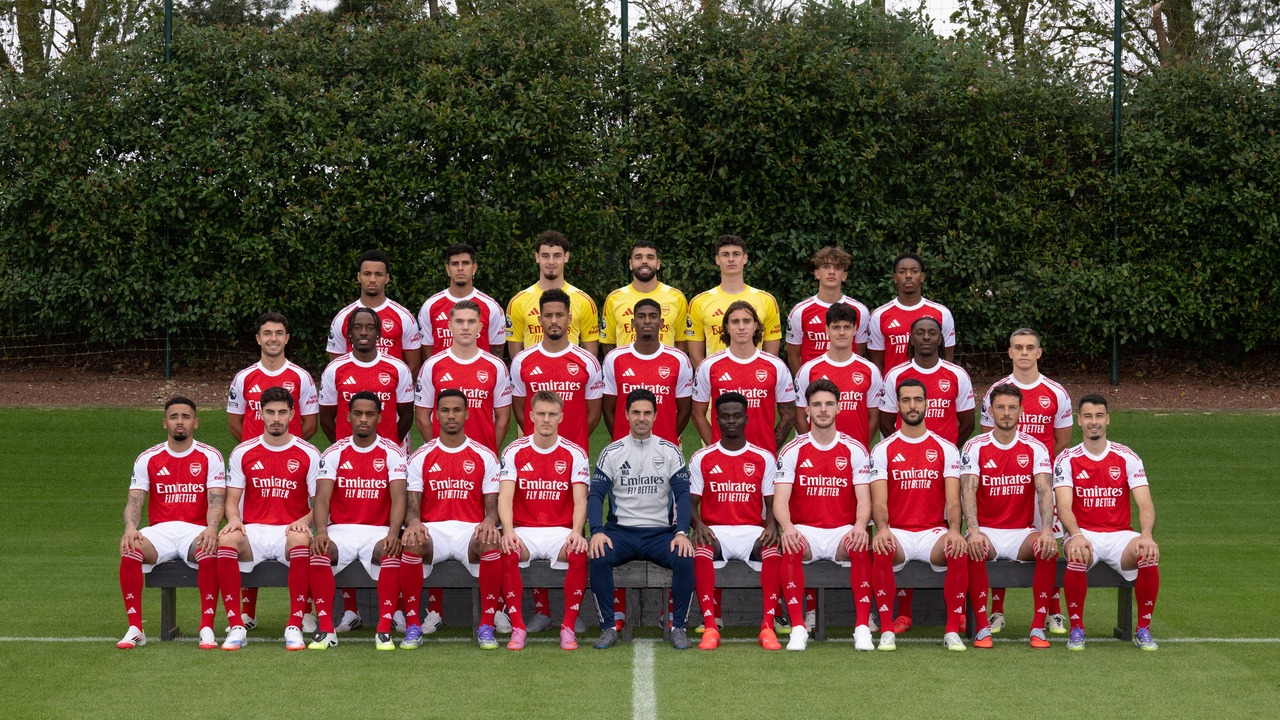 Arsenal players and coaches pose for a squad photograph