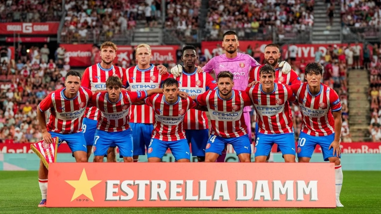 Girona players pose for a team photograph