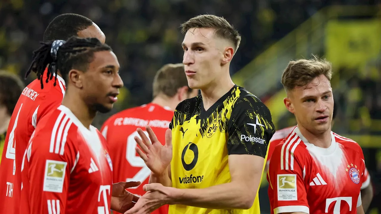 Bayern Munich and Borussia Dortmund players greet each other