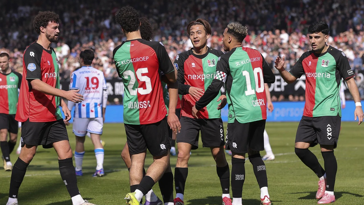 NEC Nijmegen players gather on the pitch after a match