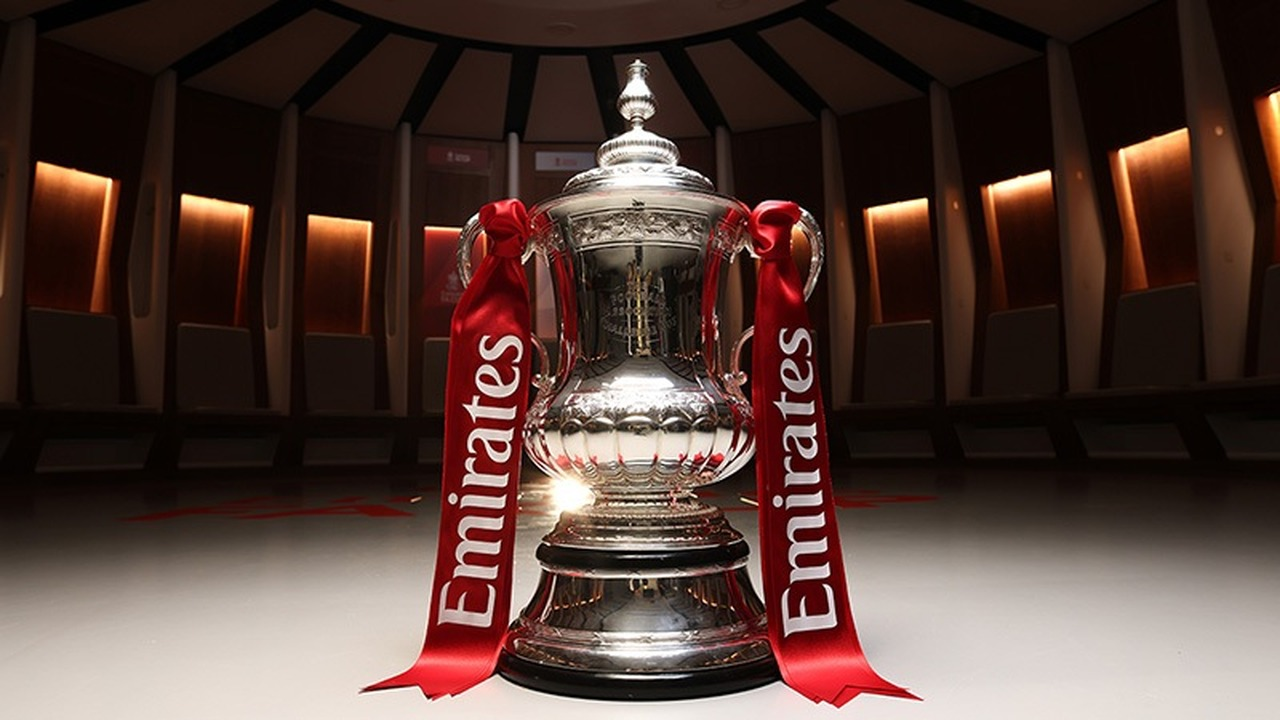 The FA Cup trophy stands in a display area