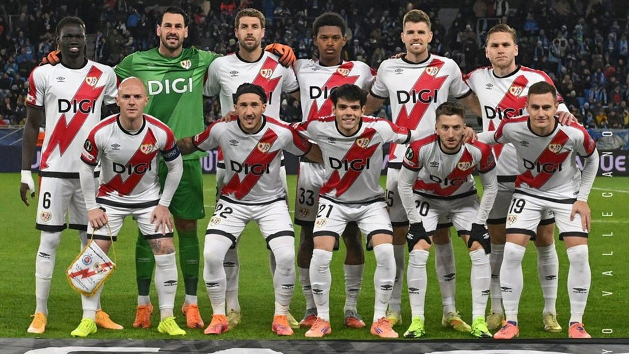 Rayo Vallecano players pose together before a match