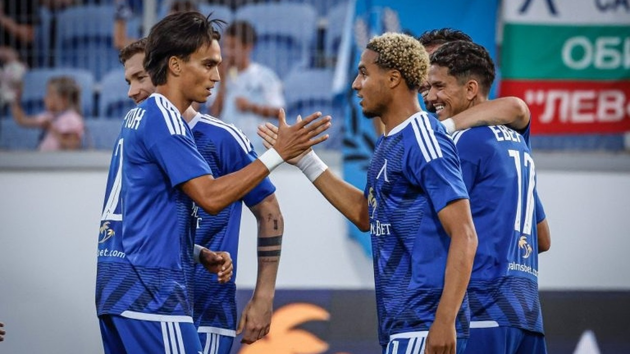 Levski Sofia players stand together on the pitch
