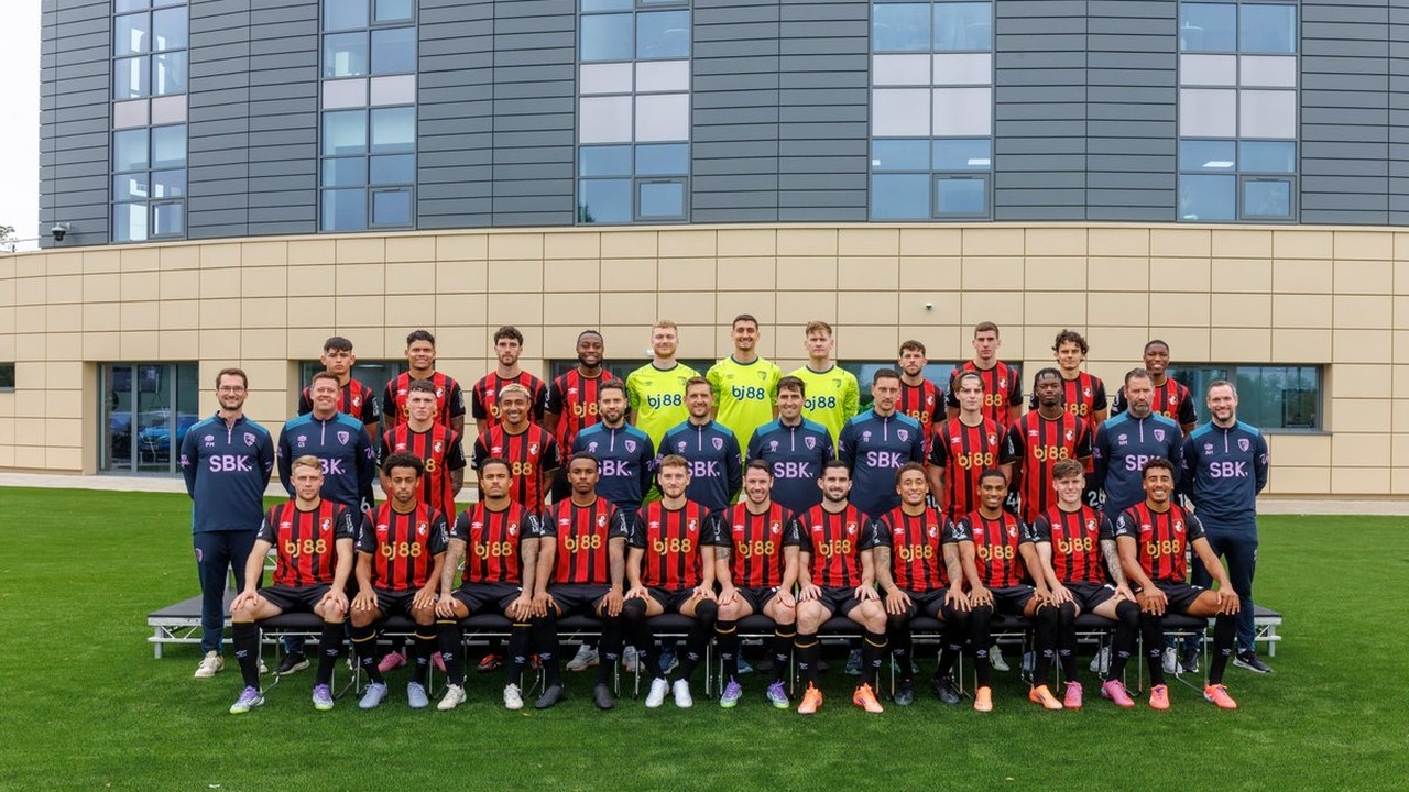 Bournemouth players and staff pose together at their training ground